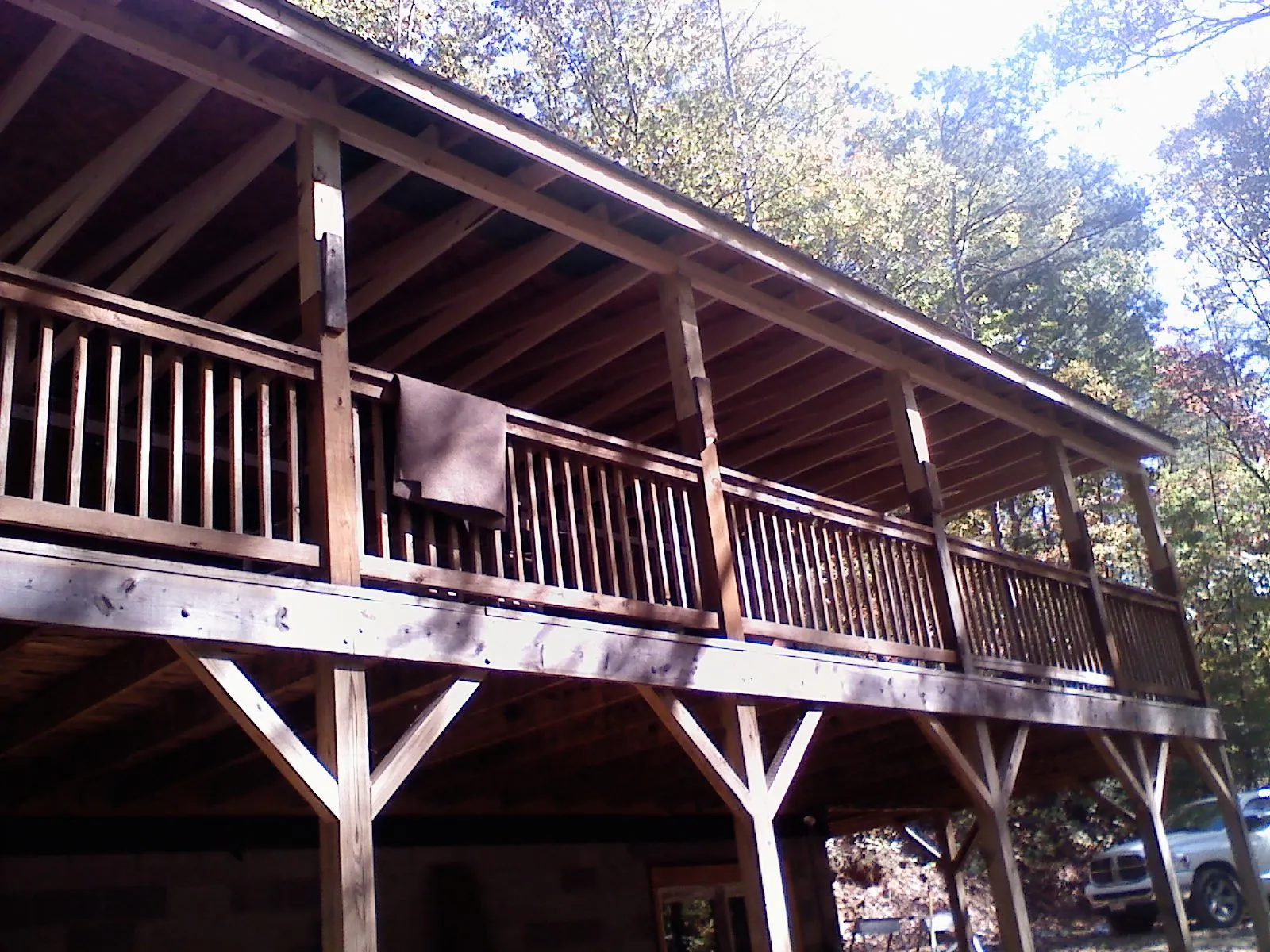 Timber framing under a new elevated porch and deck — Roof Leak Repair in Newfields by Roofing Brothers